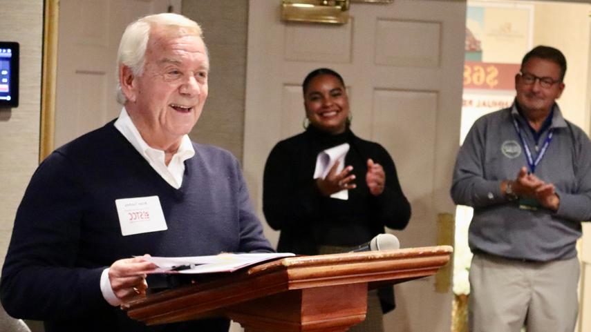 Brian Touhey speaking at alumni event